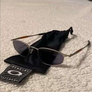 Oakley Silver and Black Sunglasses